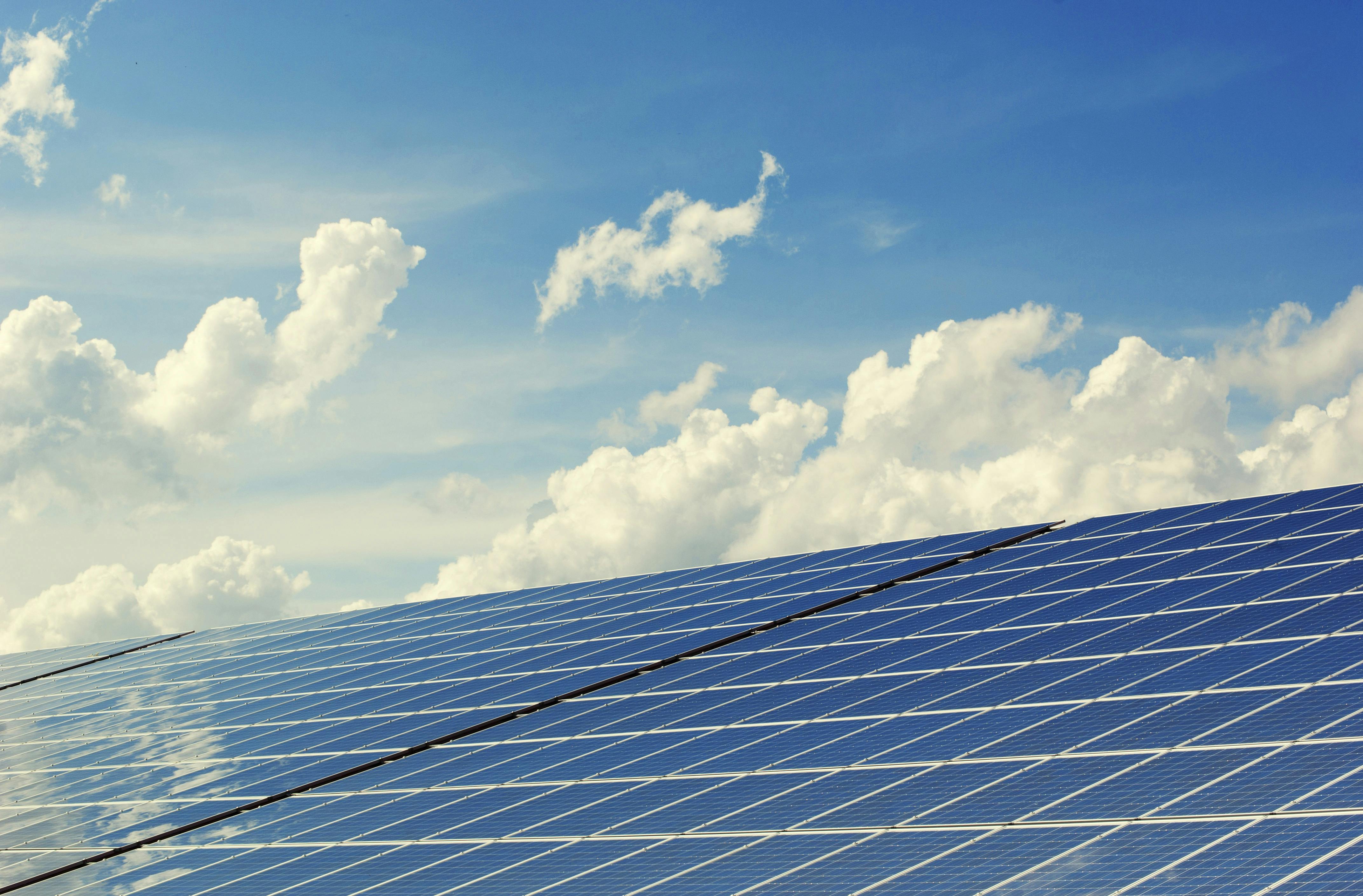 image of solar panels and the sky