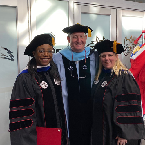 Thea Charles and Dawn Nachtigall at Ph.D. hooding ceremony with Dr. Keith Sheppard.