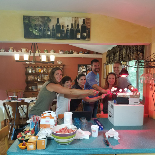 Members of the Master Teacher Algebra 2 PLT build solar marshmallow cookers