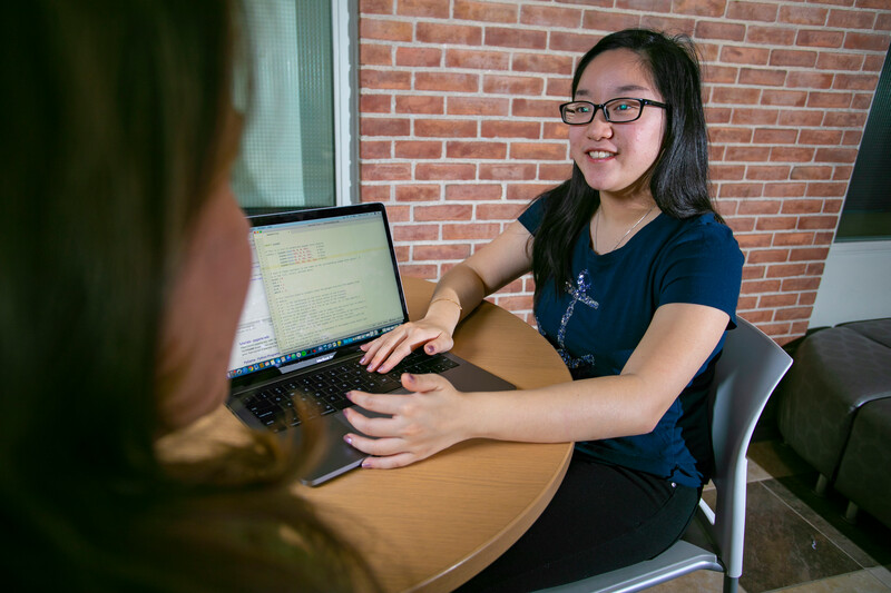 Engineering Problem Solving with AI student with computer coding